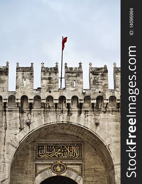 Turkey, Istanbul, Topkapi Palace, a turkish flag at the entrance of the palace