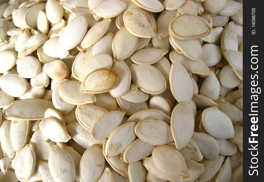 A pile of sunflower seeds on a market