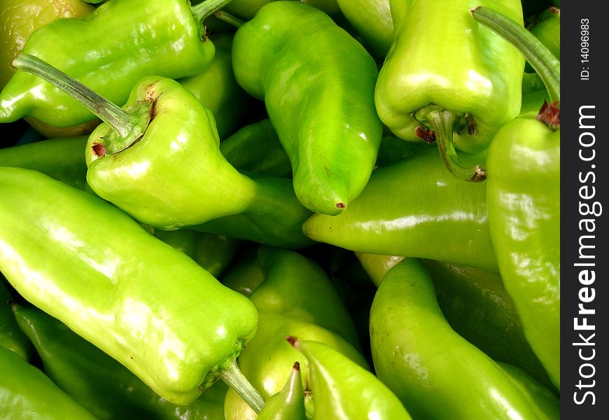 Green chilli hulls on a market