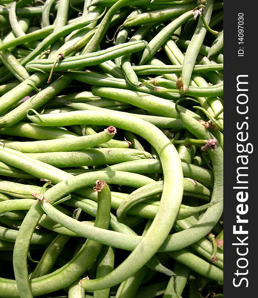 A Pile of Green beans on a market
