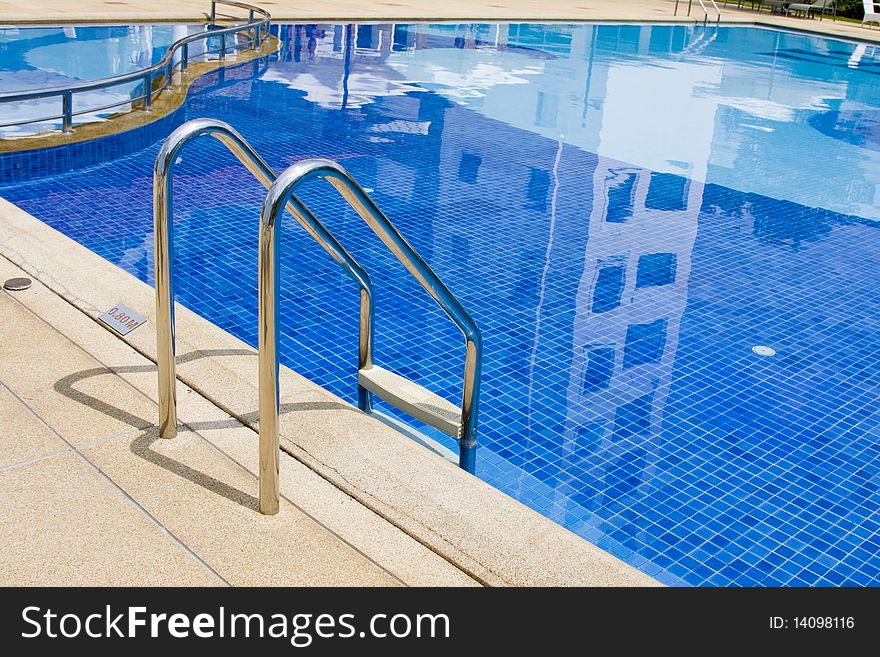 Swimming pool in tropical hotel