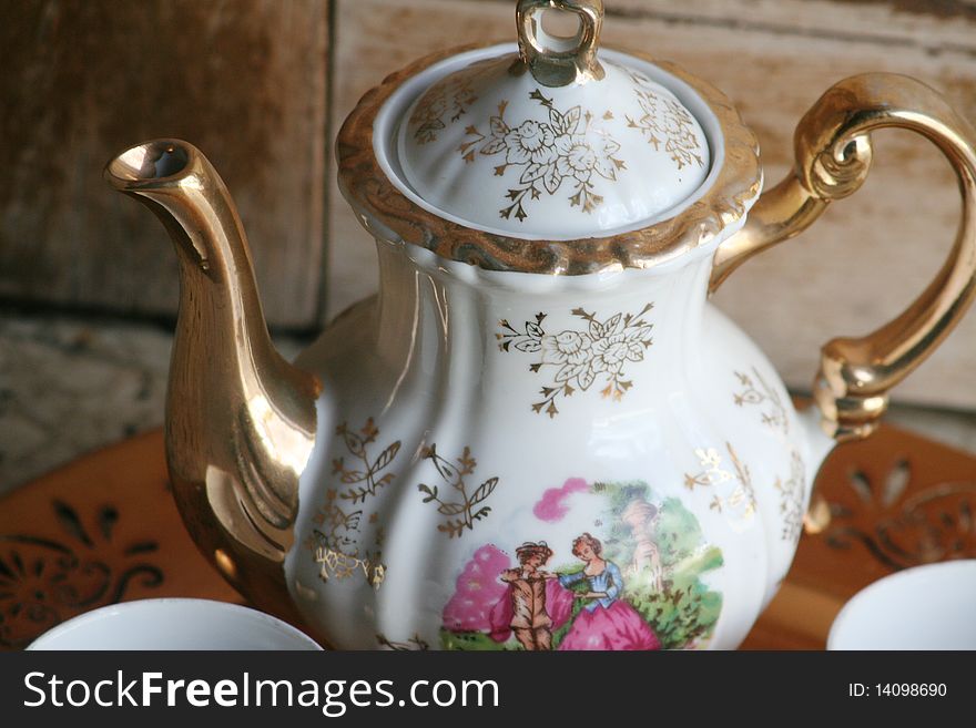 A photograph of an elegant China tea pot. A photograph of an elegant China tea pot.