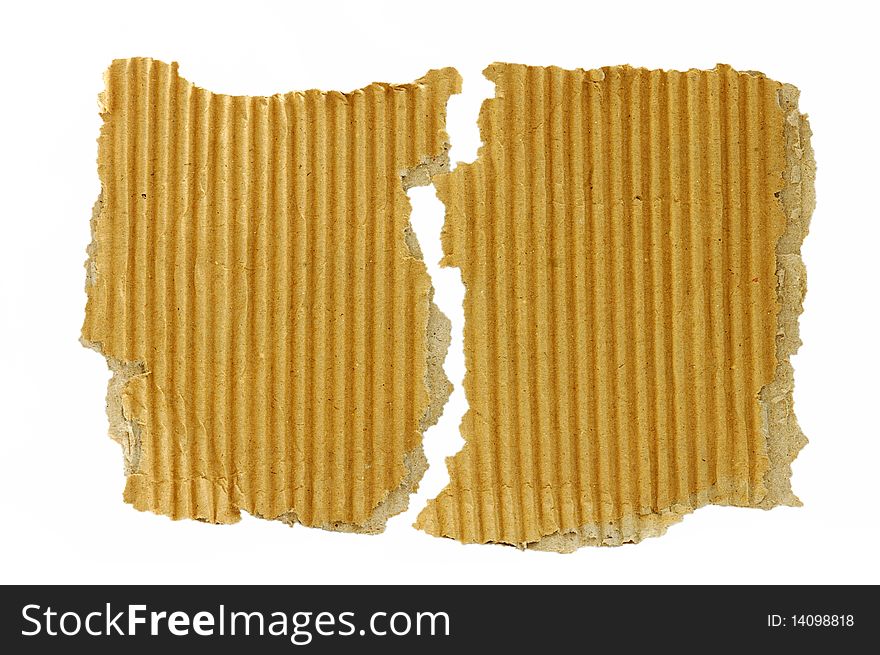 Torn cardboard scraps isolated on a white background. Torn cardboard scraps isolated on a white background