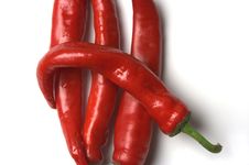 Four Red Hot Chilli Peppers Closeup Royalty Free Stock Images Four Red Hot Chilli Peppers Closeup Royalty Free Stock Images