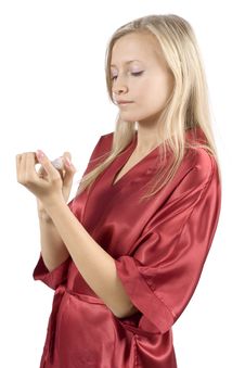 Young Woman Dressed Red Bathrobe Painting Nails Stock Photography Young Woman Dressed Red Bathrobe Painting Nails Stock Photography