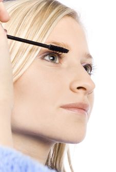 Closeup Of Young Woman S Face Putting Mascara Stock Photos Closeup Of Young Woman S Face Putting Mascara Stock Photos