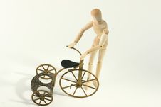 Child Or Man Inspecting A Tricycle Stock Images