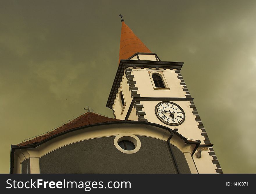 Looking the church tower before storm. Looking the church tower before storm