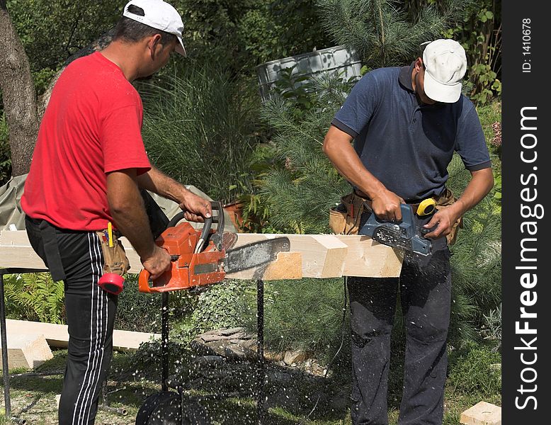 Working carpenter. Preparing elements for roof construction. Working carpenter. Preparing elements for roof construction