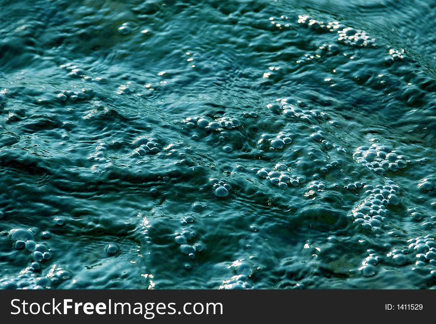 Photo of blue water waves. Photo of blue water waves