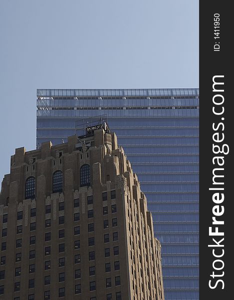 Historical office building in front of a modern skyscraper. Historical office building in front of a modern skyscraper