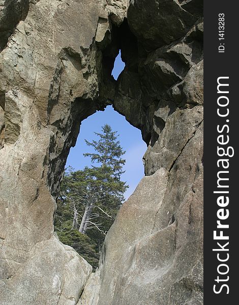 Hole in a Sea Stack at Ruby Beach - Olympic National Pakr. Hole in a Sea Stack at Ruby Beach - Olympic National Pakr