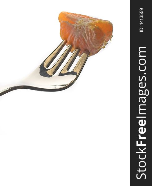Fork with orange isolated in a white background