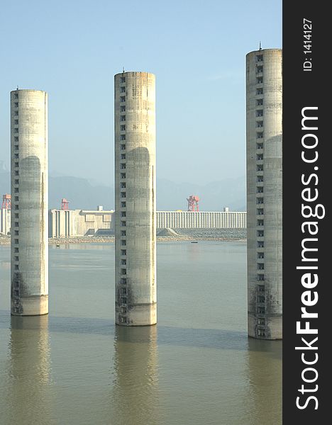 Mooring stations for boats waiting to enter the ship locks of the Three Gorges Dam (in the background). Mooring stations for boats waiting to enter the ship locks of the Three Gorges Dam (in the background).