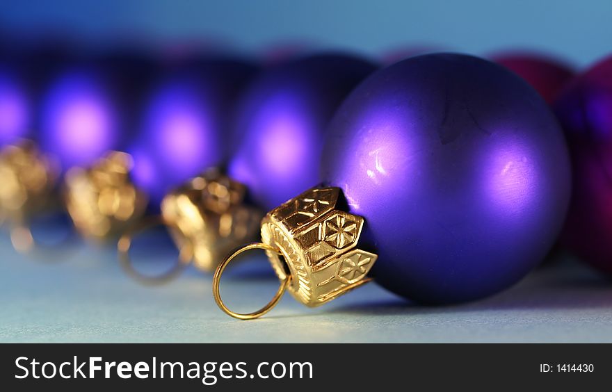 Blue  christmas ball on the blue background