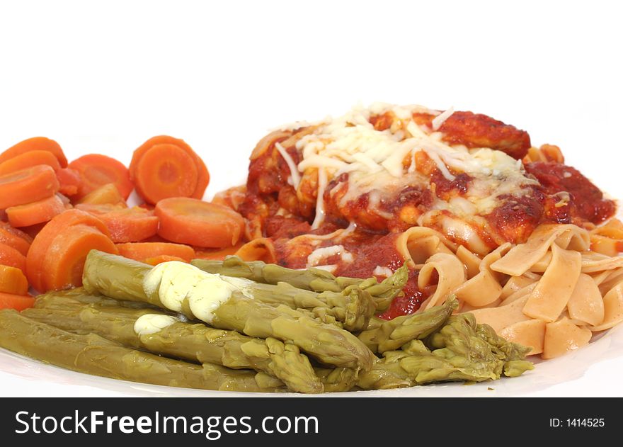 Baked Chicken with Marinara Sauce, Cheese and  Wheat Pasta with Carrots and Asparagus. Baked Chicken with Marinara Sauce, Cheese and  Wheat Pasta with Carrots and Asparagus