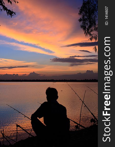 Fishing while sunset on holiday. Fishing while sunset on holiday