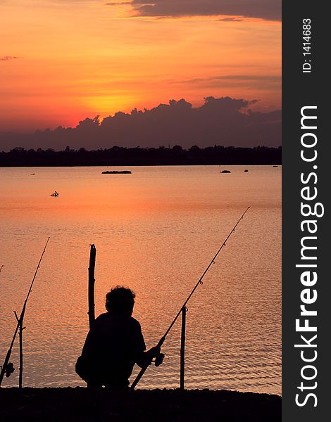 Fishing while sunset on holiday. Fishing while sunset on holiday