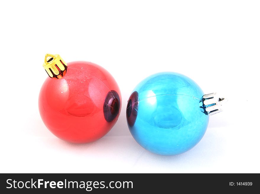 Two red and blue christmas ball ornaments. Two red and blue christmas ball ornaments