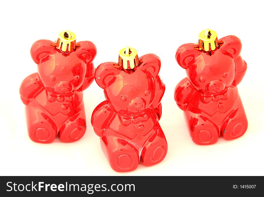 Three red christmas tree bear ornaments. Three red christmas tree bear ornaments
