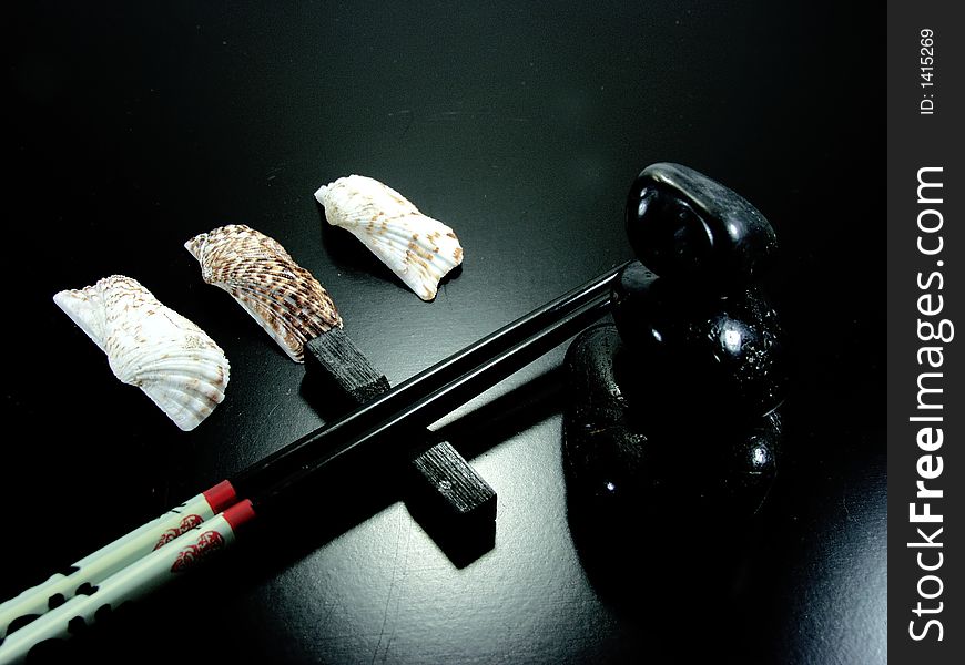 Japanese zen composition whit sea shells and chopsticks. Japanese zen composition whit sea shells and chopsticks