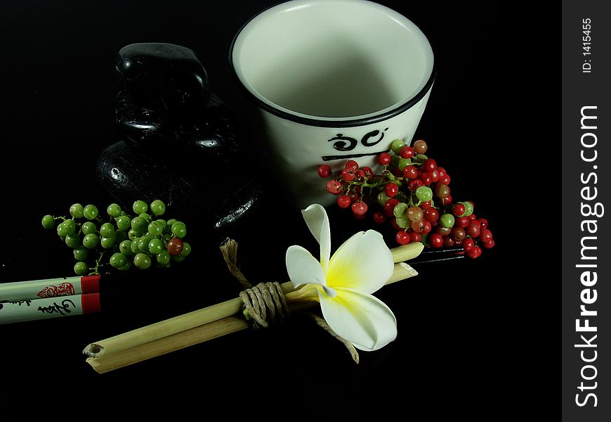 Japanese zen composition whit white flower and tea cup. Japanese zen composition whit white flower and tea cup