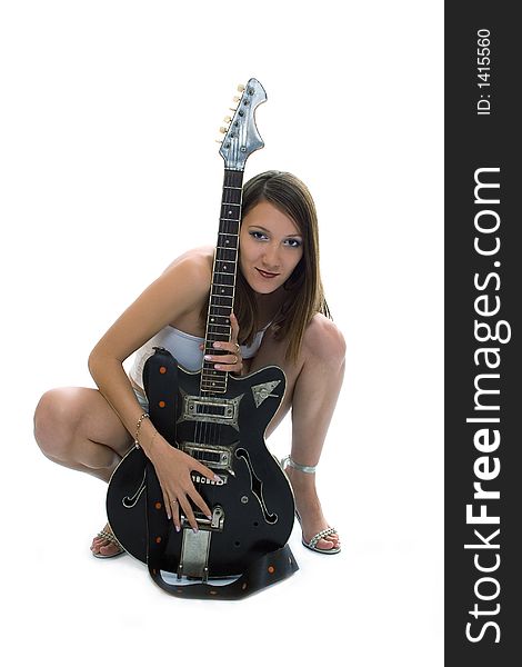 Beauty girl with guitar on white