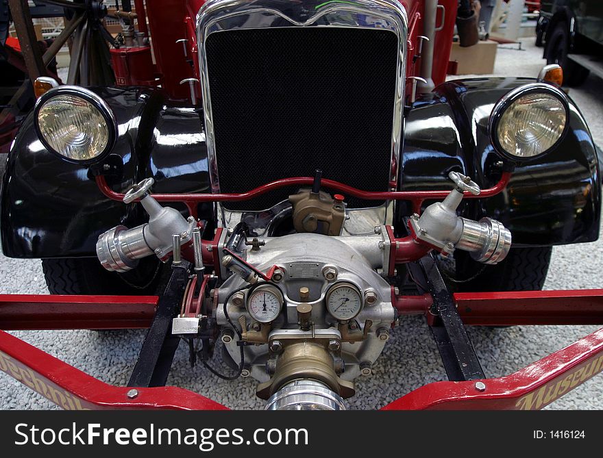 Detail front shot of an old fire truck. Detail front shot of an old fire truck