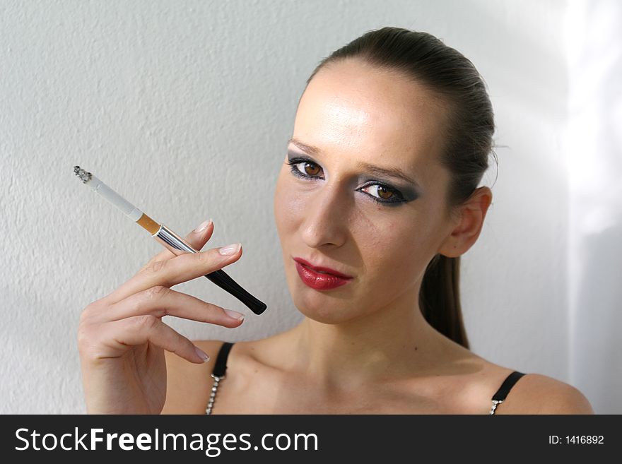 A Shot of a girl smoking outdoor. A Shot of a girl smoking outdoor