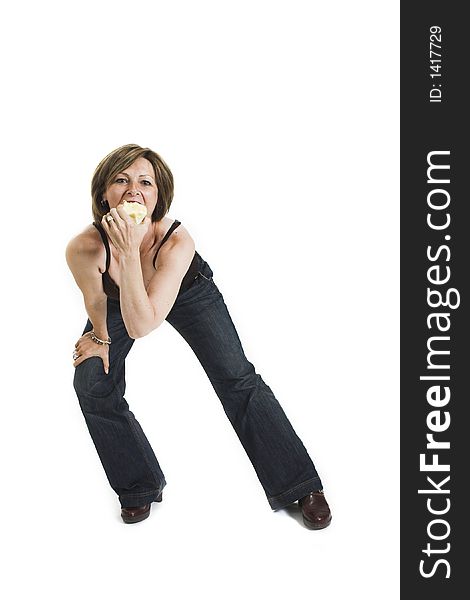 Woman eating an apple over white background