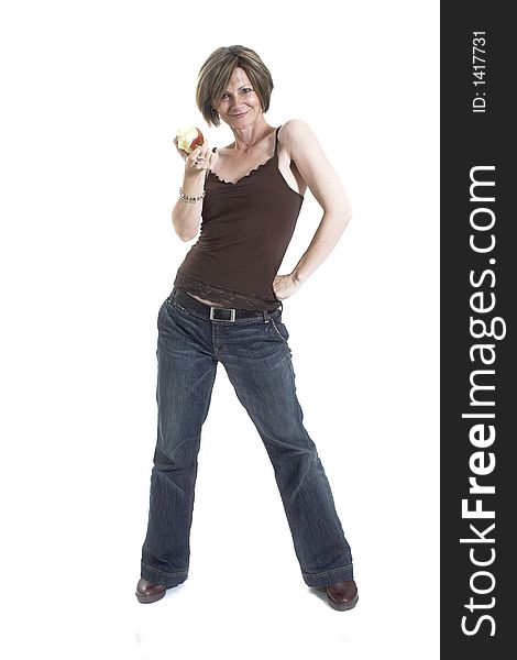 Woman eating an apple over white background