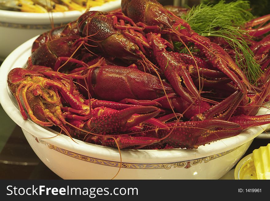 Bowl of boiled crayfish on a table. Bowl of boiled crayfish on a table