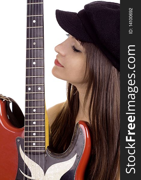 Young woman with beret hat holding red electric guitar. Young woman with beret hat holding red electric guitar