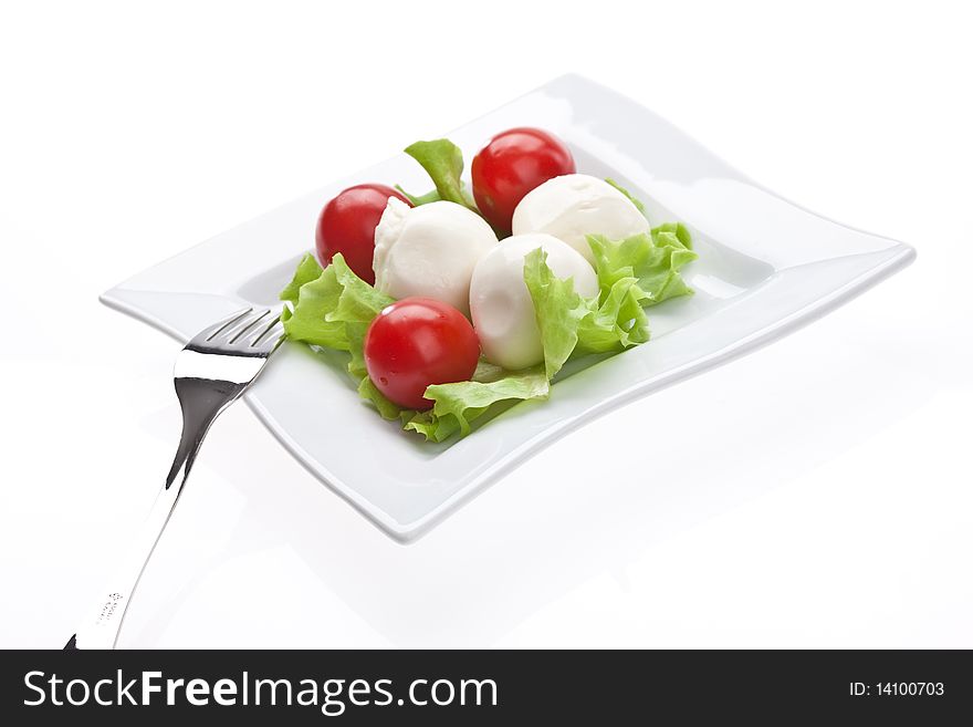 Food series: mozzarella, tomato and letuuce over white