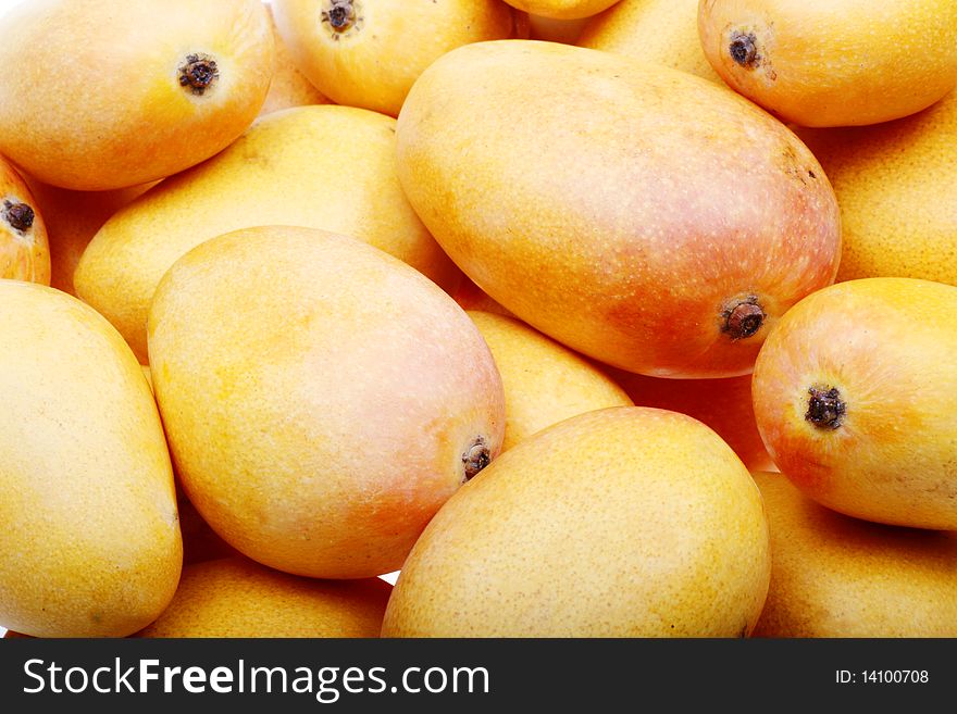 Close-up of some fresh mangoes. Close-up of some fresh mangoes.