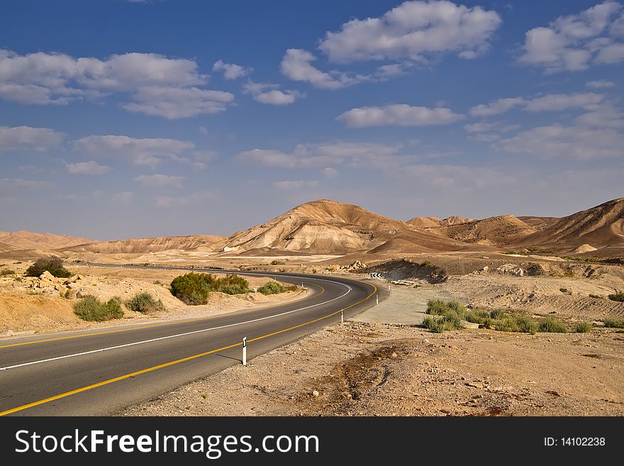 Desert highway and sky. Negev desert. Israel
