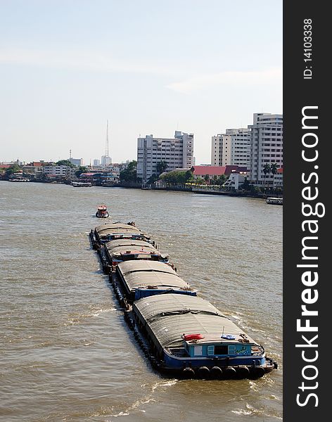 Tug boat on the Chao Phraya River at  Bangkok, Thailand