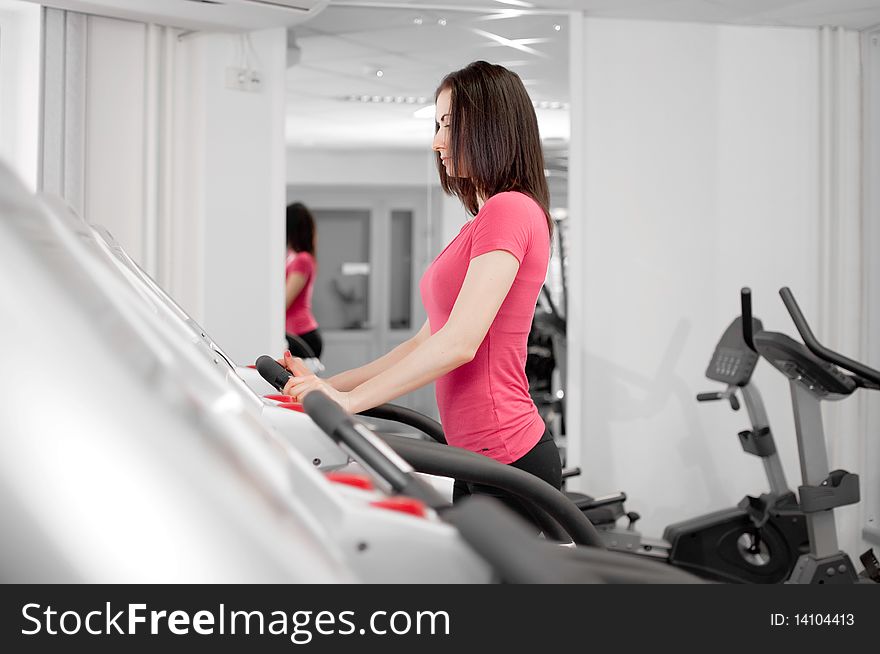 Woman On A Running Simulator