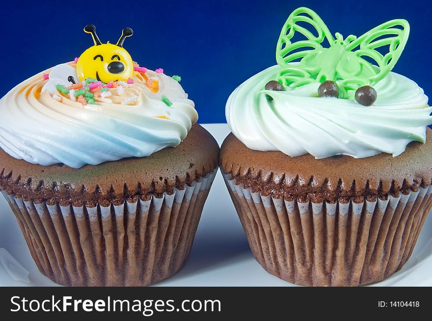 Fun cupcakes with cream meant for little kids. Fun cupcakes with cream meant for little kids
