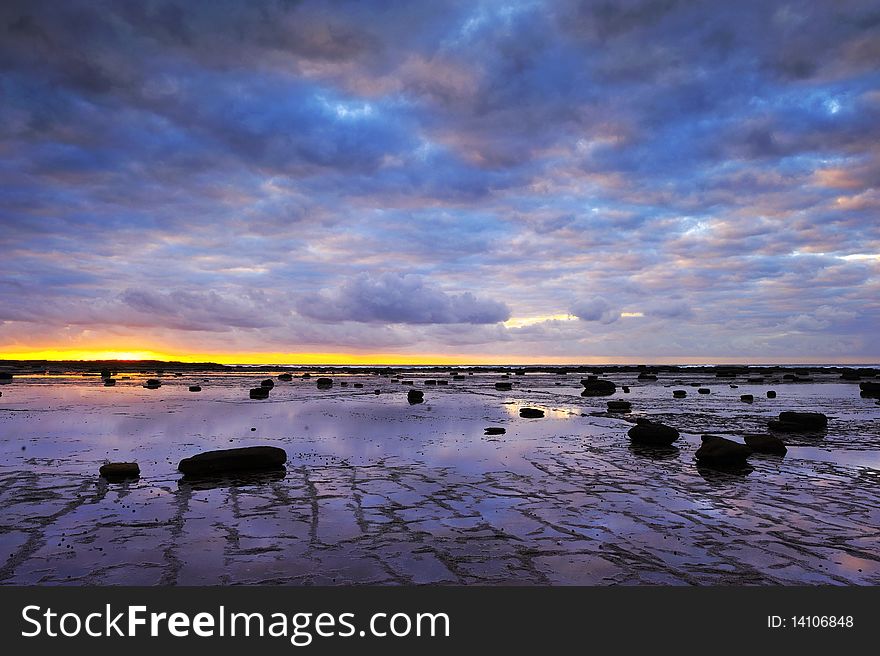 Sunrise in Long Reef, Sydney, near Dee Why beach. These rocks looks funny. Sunrise in Long Reef, Sydney, near Dee Why beach. These rocks looks funny.