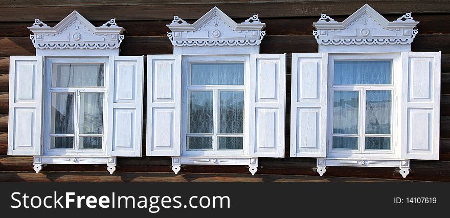 Part of a rural house. Three windows.