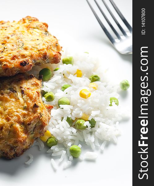 Baked salmon burgers with vegetables rice