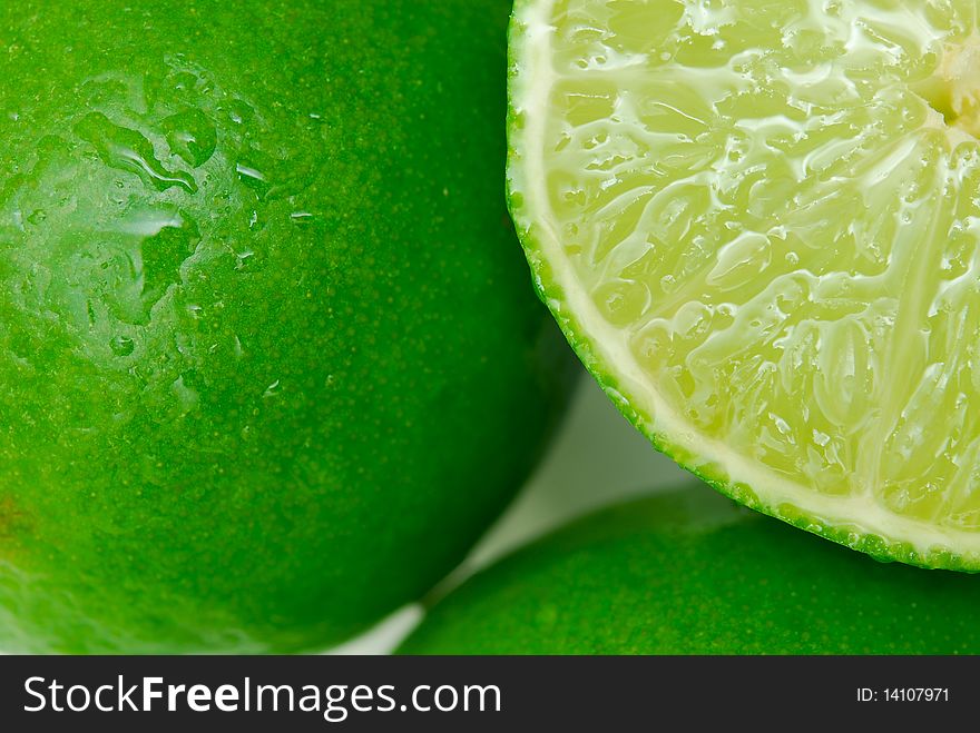 Background of juicy cut lime closeup. Background of juicy cut lime closeup