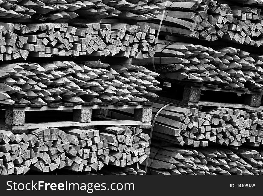 Pallets of sharpened, wooden sticks used to hold up newly planted grape vines in the Rhone Valley in France. Pallets of sharpened, wooden sticks used to hold up newly planted grape vines in the Rhone Valley in France.