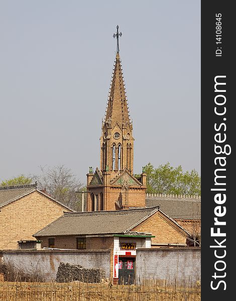 The little brick Catholicism church in the little village of China. The little brick Catholicism church in the little village of China
