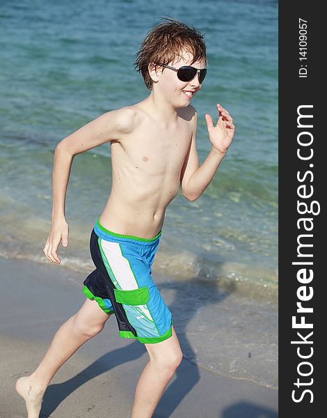 Teenager Jogging along the Shoreline