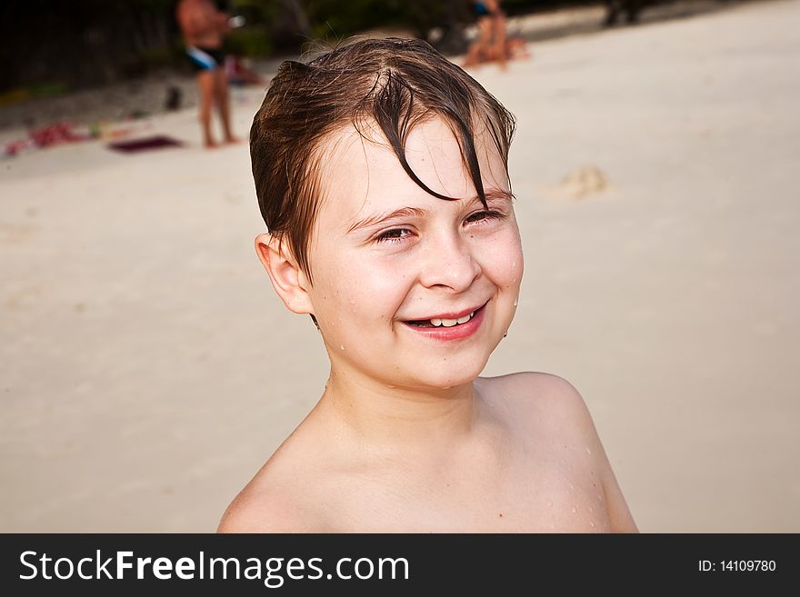 Young Happy Boy At The Beach