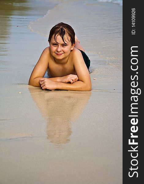 Young happy boy at the beach