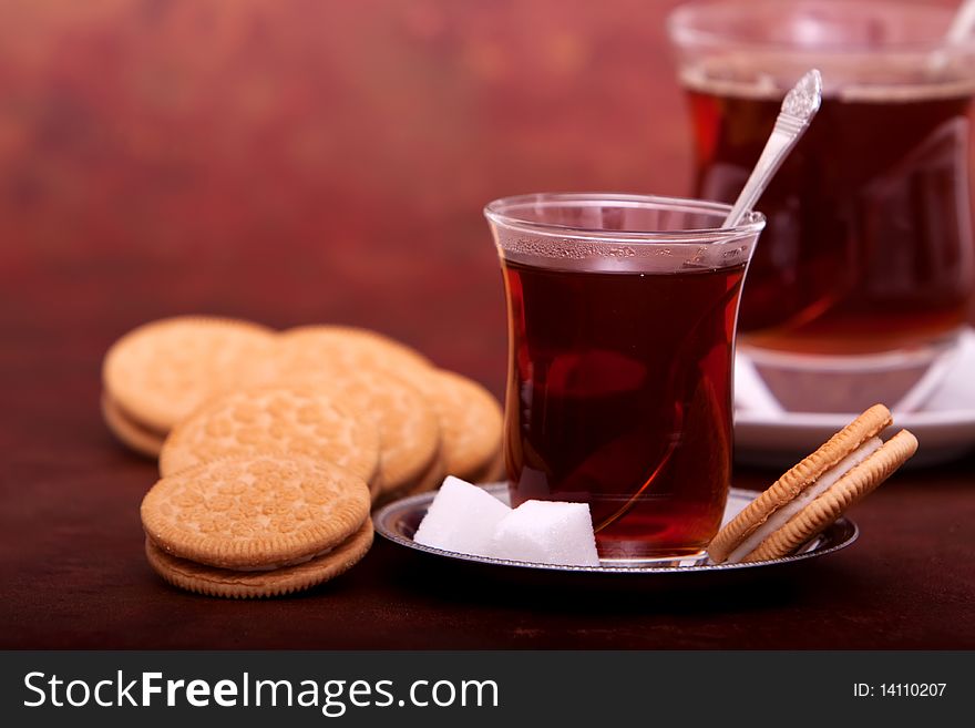 Glass of tea and cookies