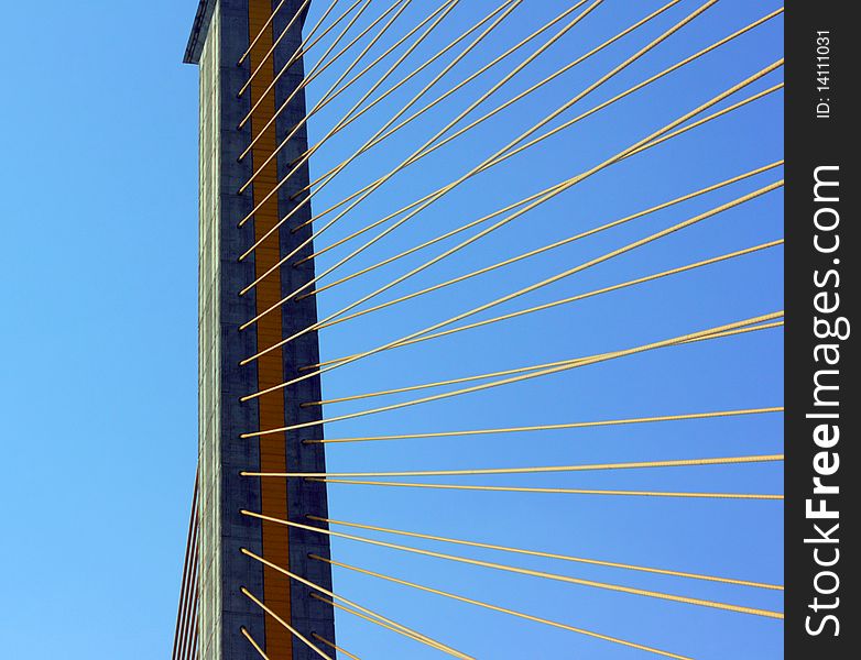 Detail of cable-stayed bridge, with yellow cables